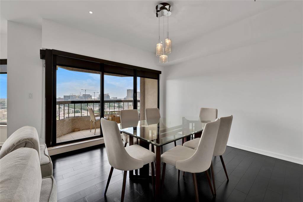 The dining room is located across from the kitchen. This space can accommodate extra seating for guests.