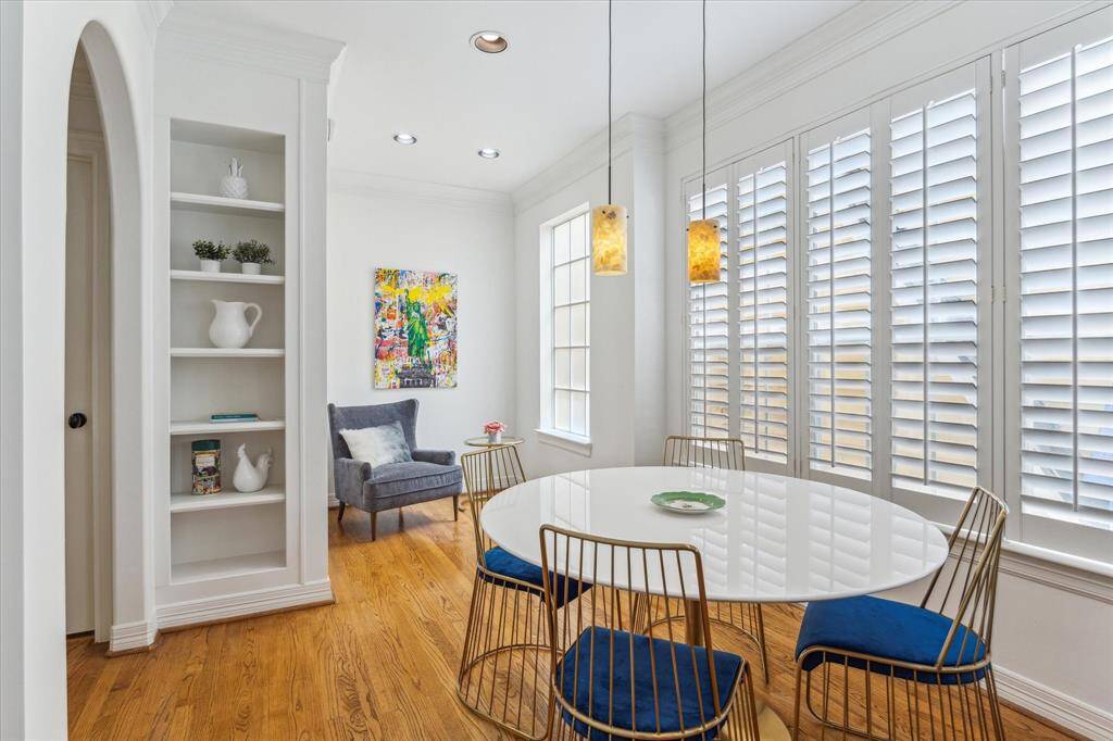 Plantation shutters and pendant lights add an elegant touch.