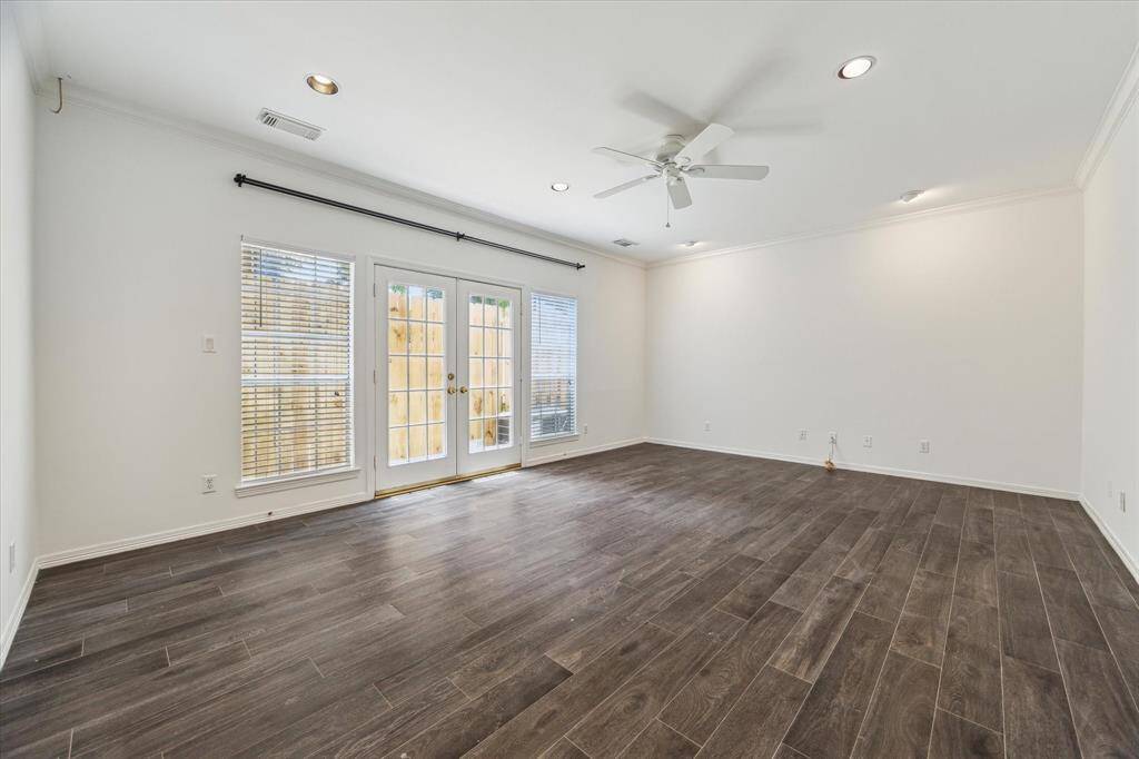 The flexible floorplan includes a first-floor space perfect for a den, study, or additional bedroom—tailor it to suit your lifestyle.