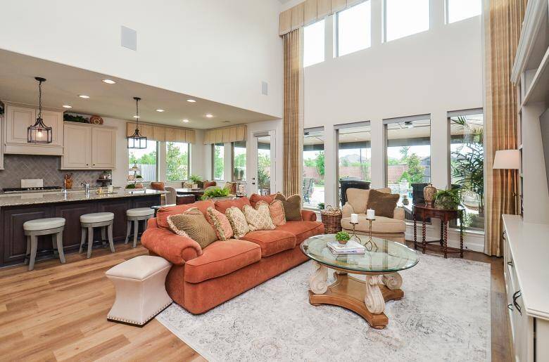 Powered Automatic Window Shades on the Rear Family & Breakfast Room Windows.