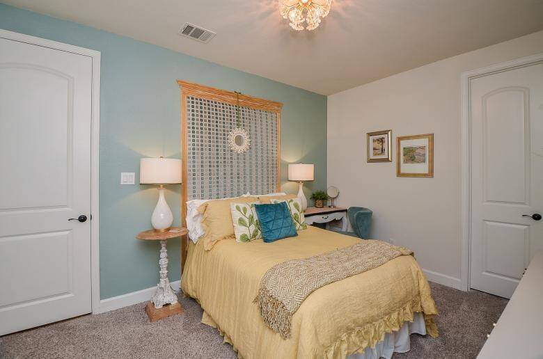 Downstairs Secondary Bedroom with Ample Space and Large Closet- Very Lightly Lived in
