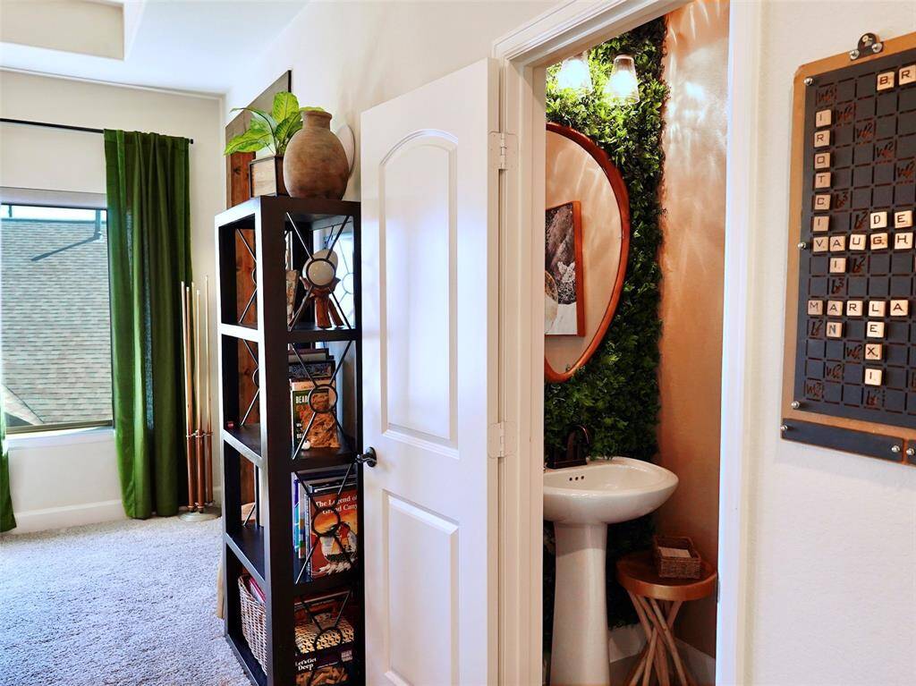 The Powder Room is Conveniently Located Off the Upstairs Gameroom.