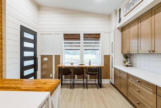 Dining area off kitchen, custom paneling