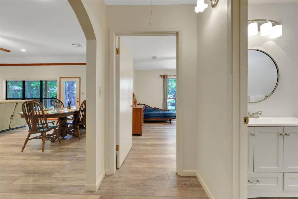 The two larger guest bedrooms are on the other side of the home with a full bath in between