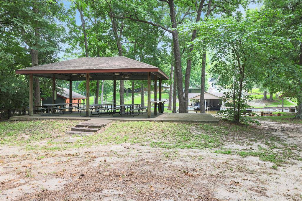 The community pavilion/picnic area is adjacent to this home