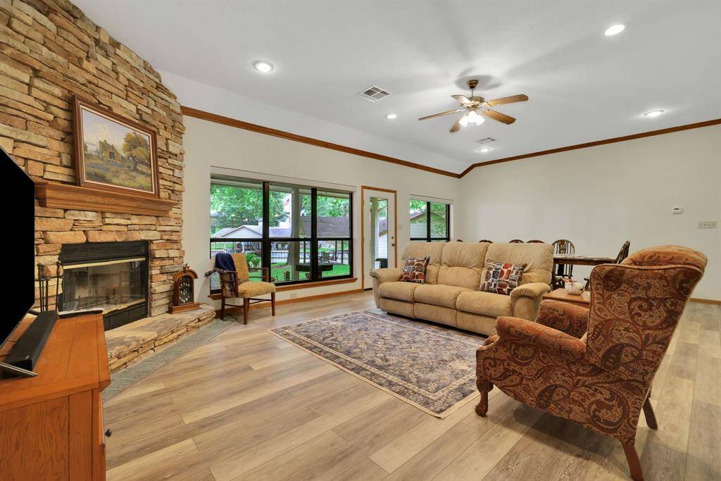 The large windows along the back of the home bring in plenty of natural light