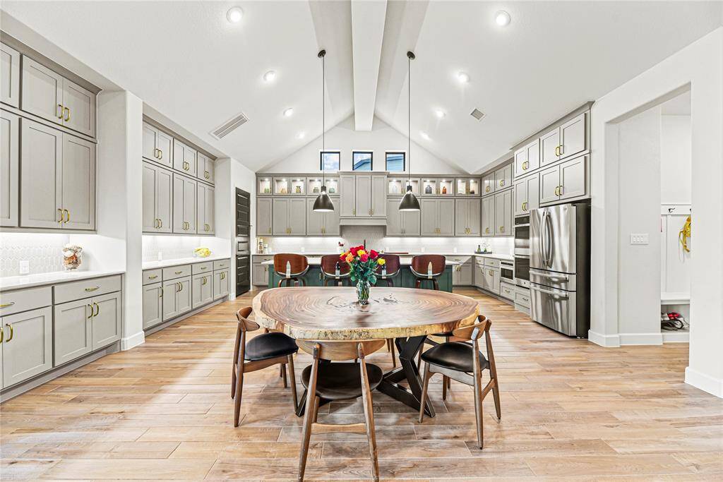 The open layout enhances flow and connection to the rest of the home, perfect for both everyday living and entertaining.