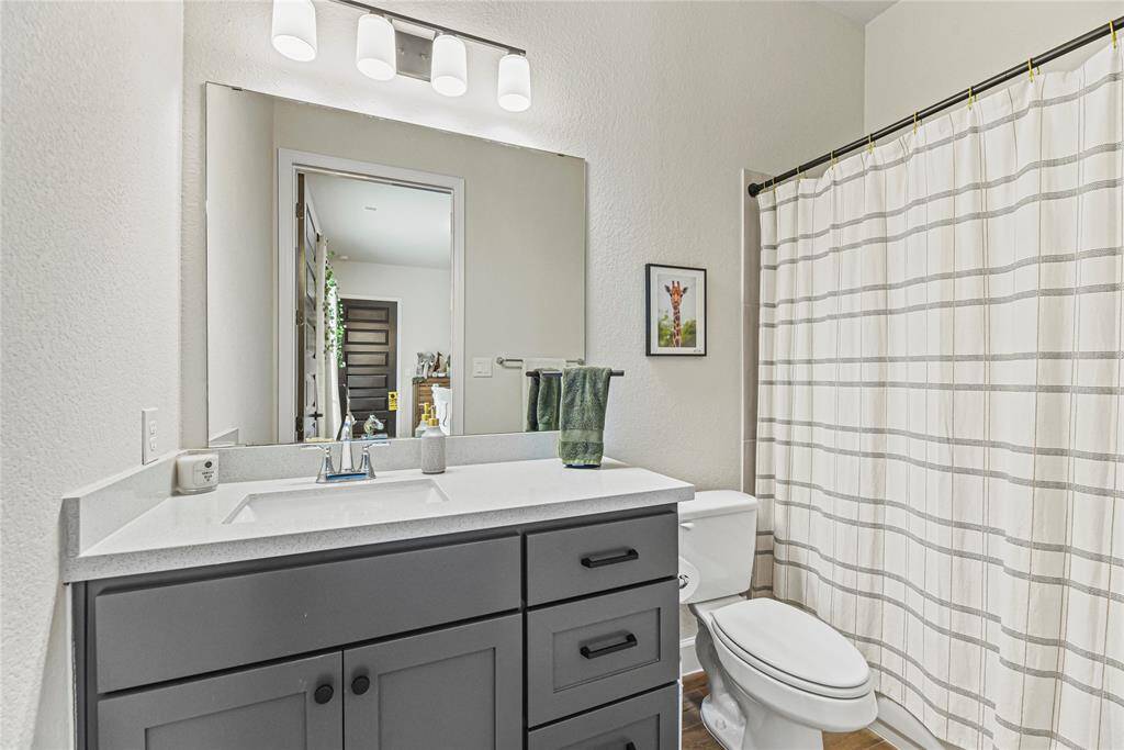 This 3rd secondary bedroom really sets this house apart!  It has it's own living space attached!  Perfect mother-in-law suite complete with ensuite bath and large walk-in closet.