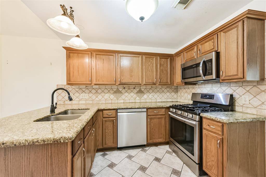 Recently updated appliances bring a fresh feel to this well-appointed kitchen.