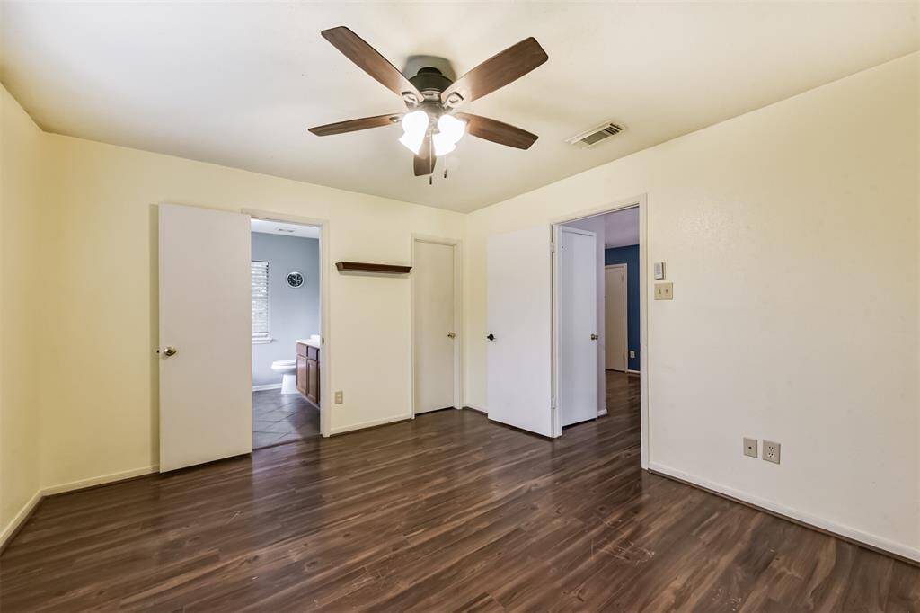 Soft natural light and wood like floors make this a restful haven.