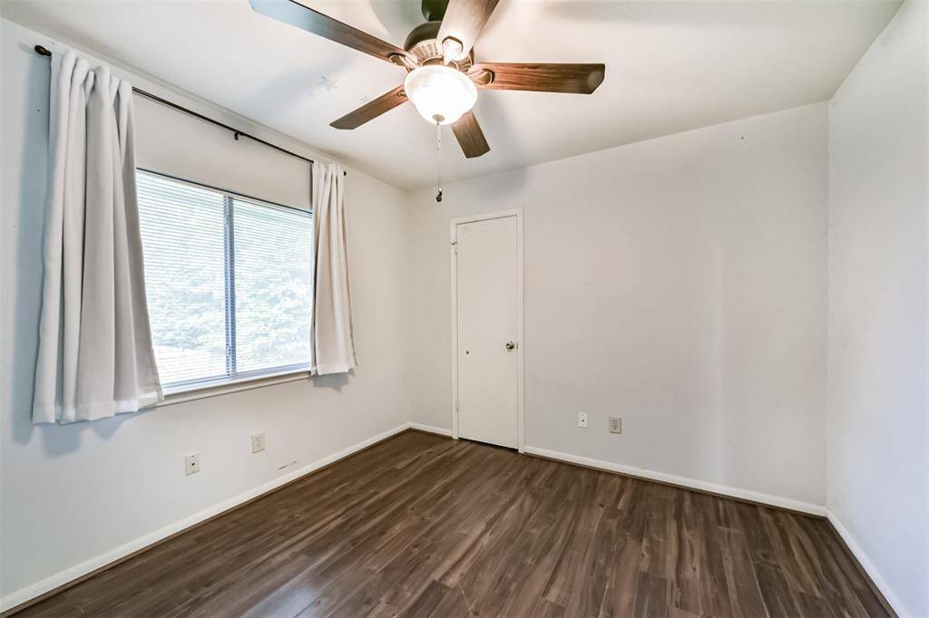 Both secondary bedrooms are generously sized with wood like floors, blinds, nice sized closets and ceiling fans.