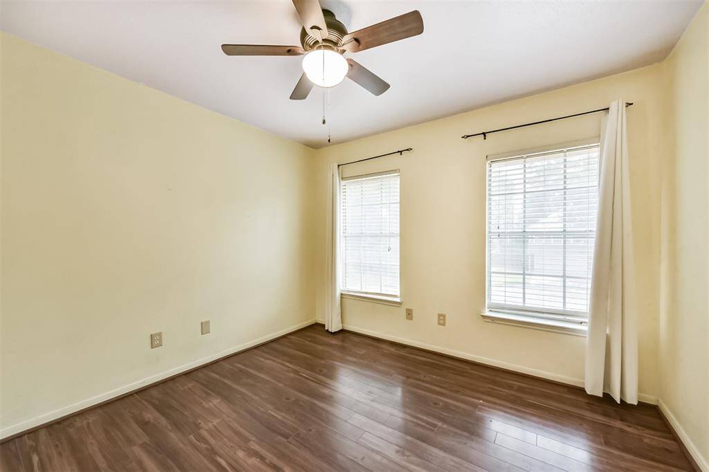 Both secondary bedrooms are generously sized with wood like floors, blinds, nice sized closets and ceiling fans.