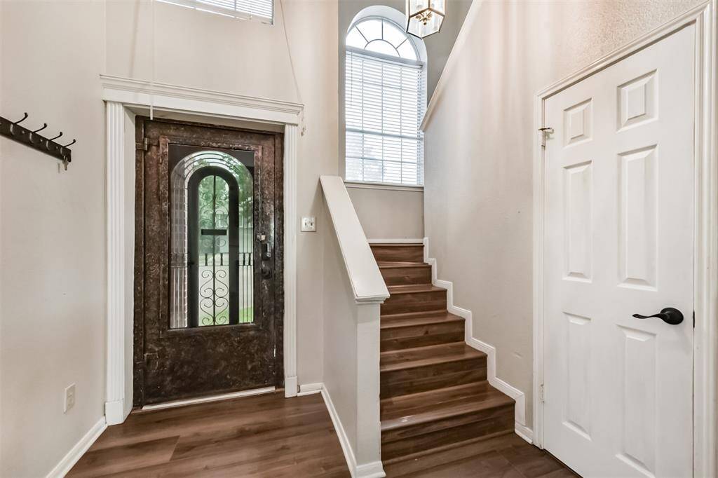 Entry foyer with the stairway to your left upon entering the home.