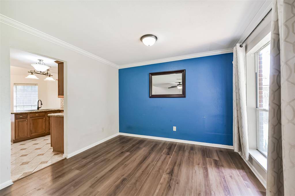 Just off of the living area is a flex space, for a dining room or home office space.