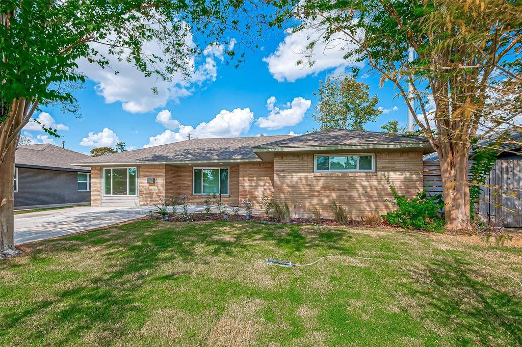 Welcome to this Oak Forest gem, featuring charming curb appeal, a welcoming driveway and a beautifully maintained front yard.