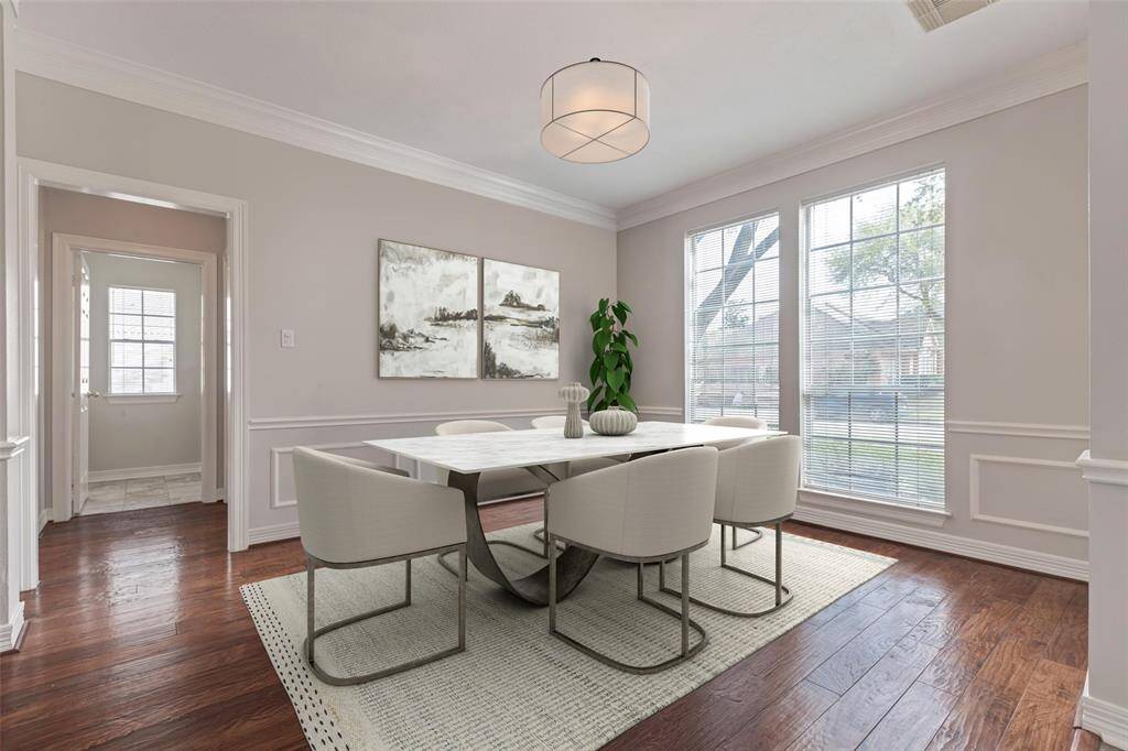 A virtually staged Dining Room sets the tone for possibilites! Imagine the conversations you'll share at your family gatherings when you feast at the dining room table.