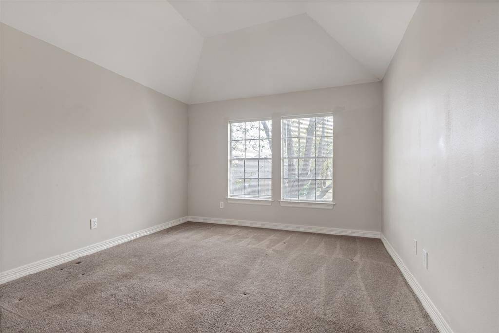 This room overlooks the shade tree in the front lawn.