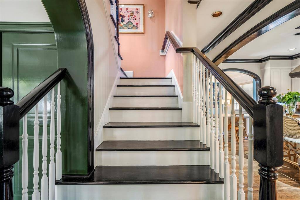 Upstairs, each bedroom is a sunlit sanctuary, designed for rest and relaxation.