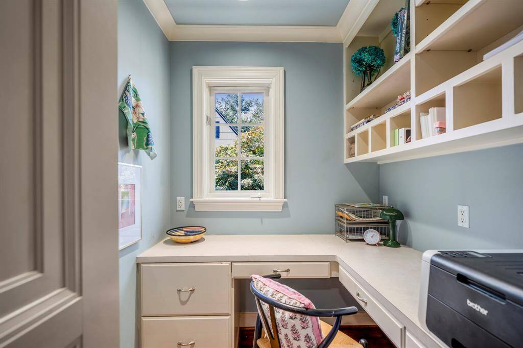 An en-suite study nook creates a quiet space for work, reflection, or a morning coffee ritual.