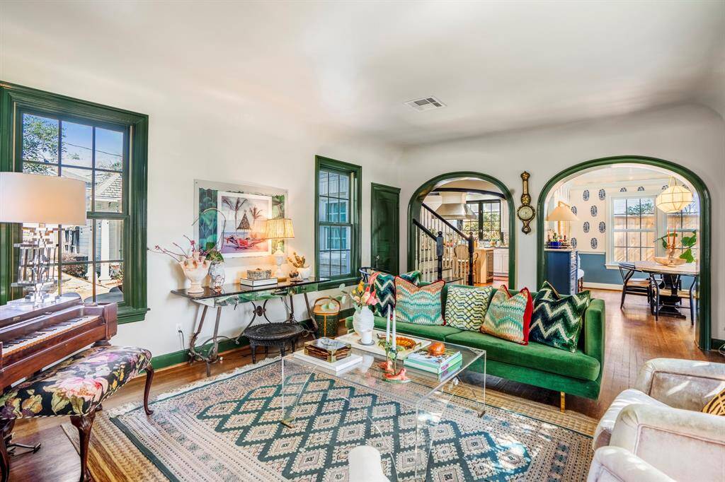 The homeowner, an interior designer with an impeccable eye, has seamlessly blended the home's original architectural charm with carefully selected finishes, preserving marble and vintage details while introducing designer wallpapers, layered textures, and rich hues that make every space feel both curated and inviting.