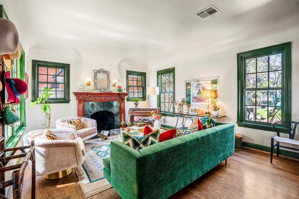 Note the architectural detail of the walls above the fireplace & window surrounds. These are the details that make this home so special & unique.