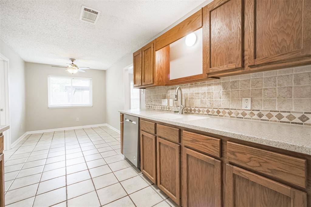 Spacious breakfast area makes it so the formal dining can be used as an office!