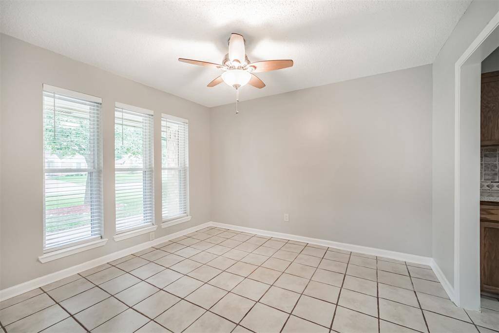 This flex space at the front of the home could be an office OR formal dining.