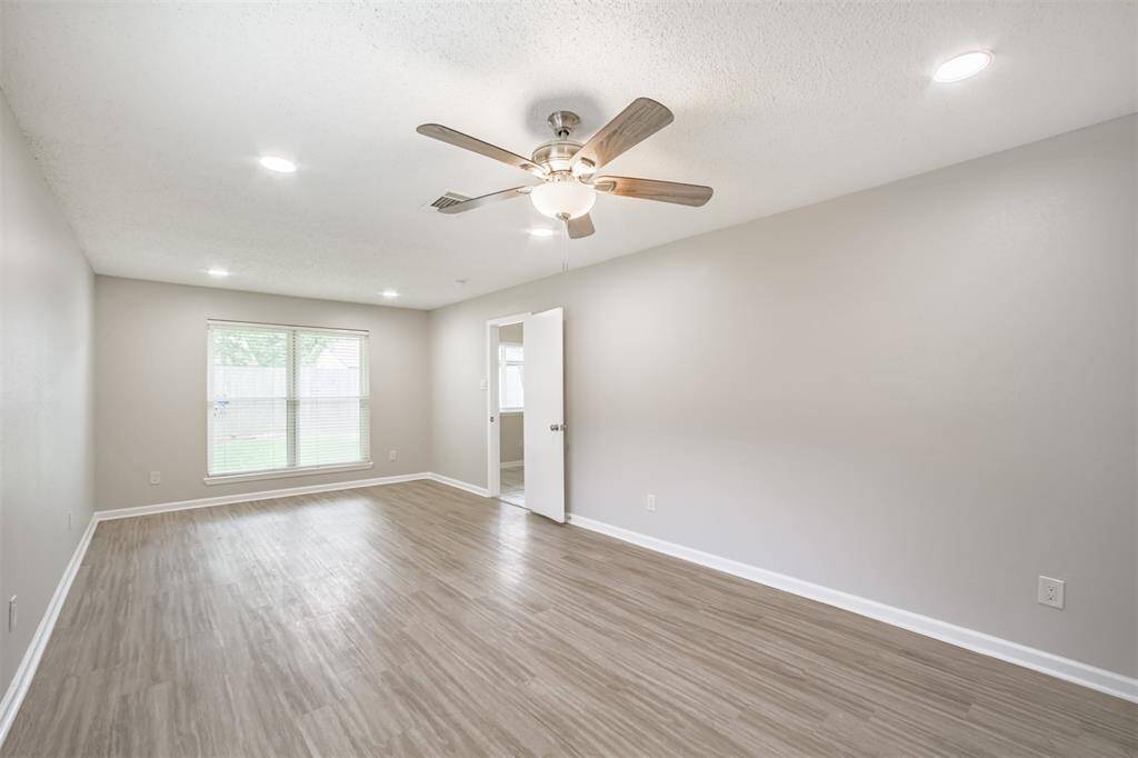The primary bedroom is huge and provides AMPLE space for a sitting area.