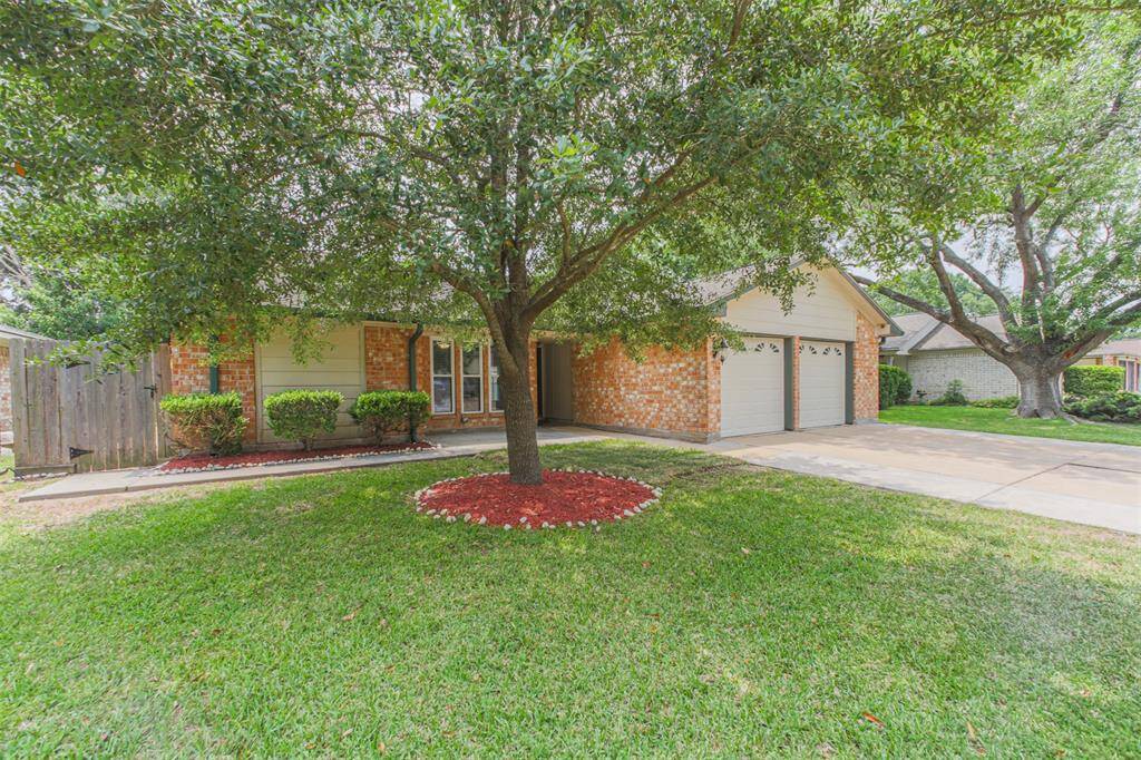 Back at your new home - very nice mature landscaping!