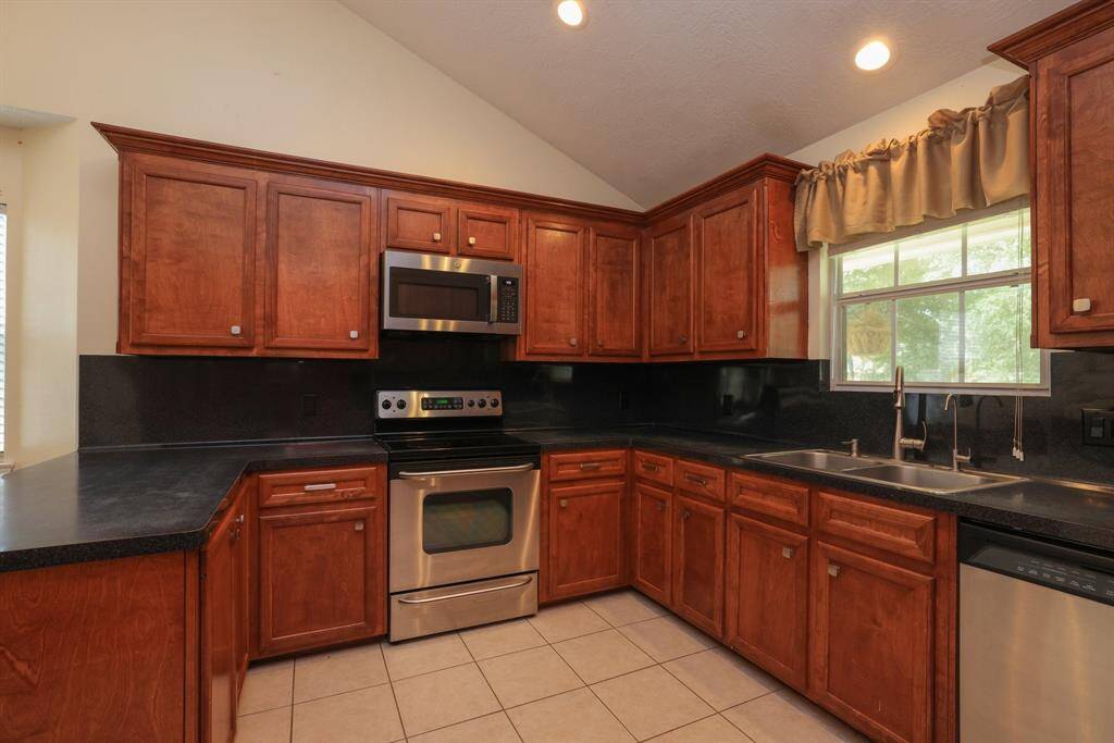 A view to the breakfast area to the utility room.