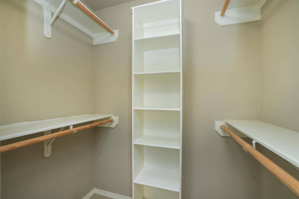 Another view of this secondary bedrooms looking toward the hallway.