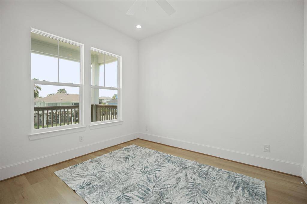 2 of 2 guest bedrooms facing the front porch