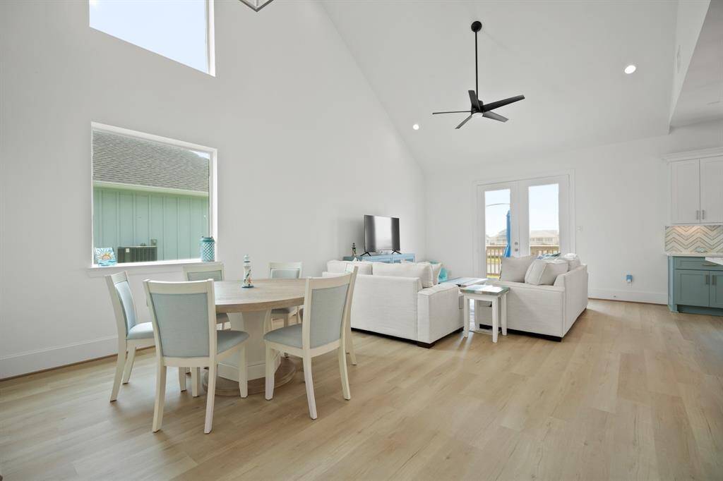 View of French doors that lead to the spacious back deck
