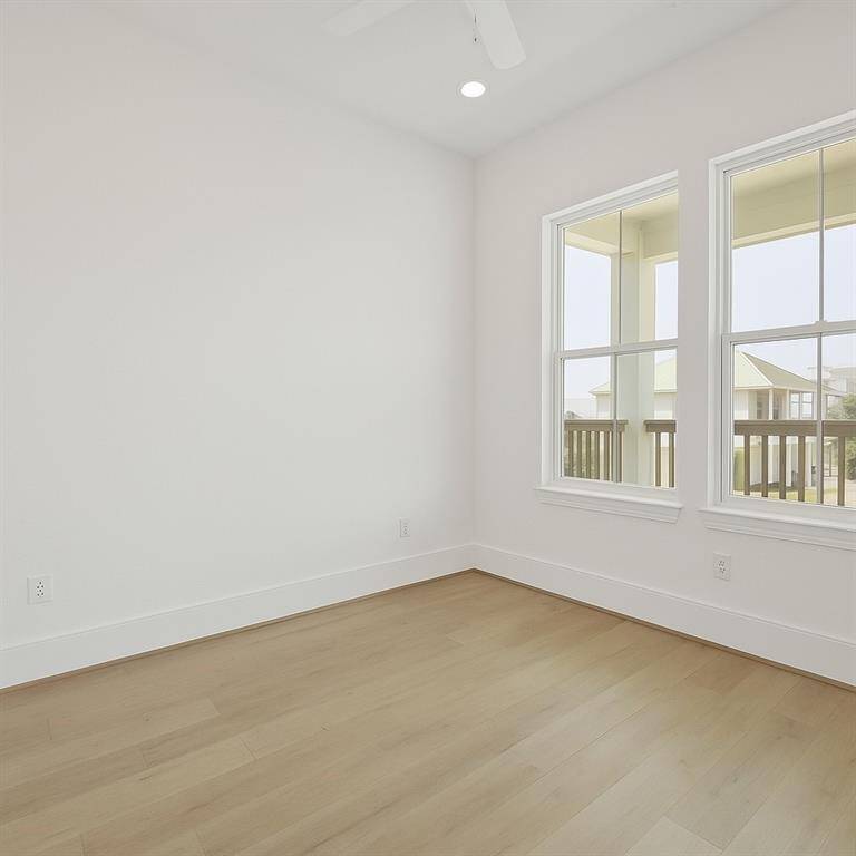 of 2 guest bedrooms facing the front porch