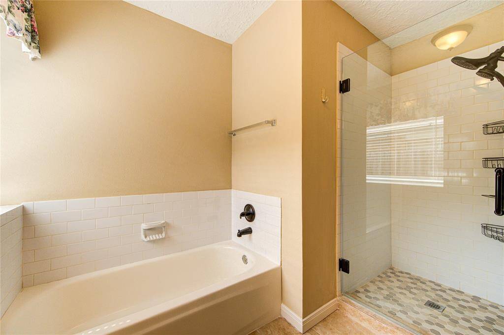 Lovely walk-in shower and soaking tub.