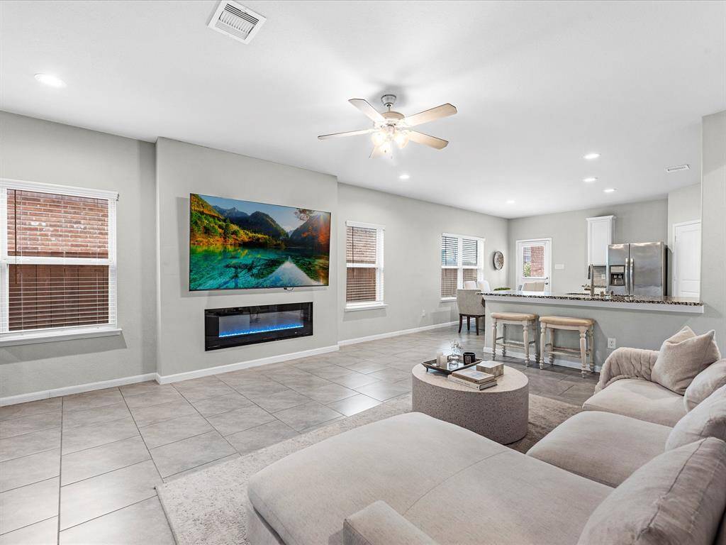 How amazing is this added electric fireplace, giving your new home the perfect aesthetic.