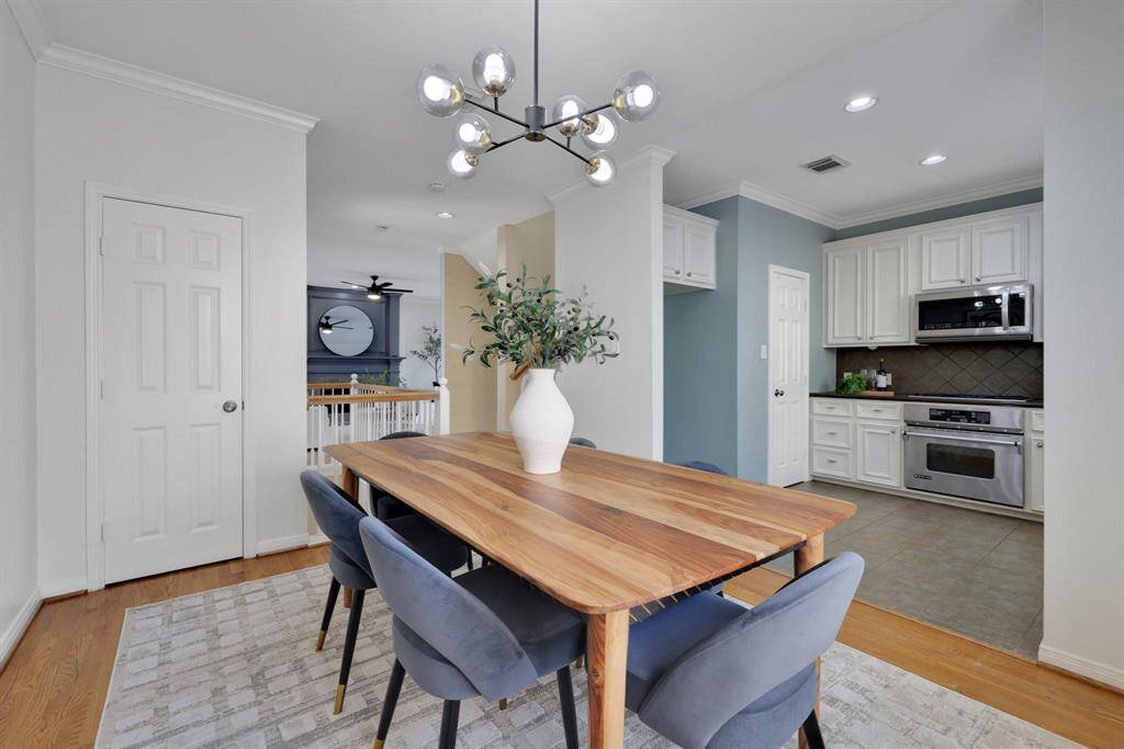 The harmonious flow between the dining area and gourmet kitchen—an entertainer’s dream
