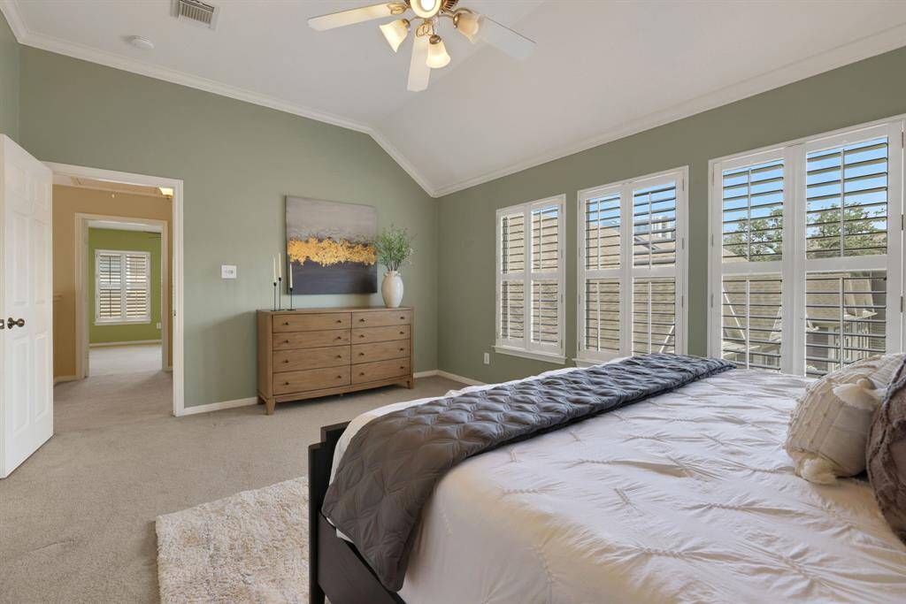 A light-filled retreat—this shot showcases how windows enhance the calm, restful feel of the primary bedroom