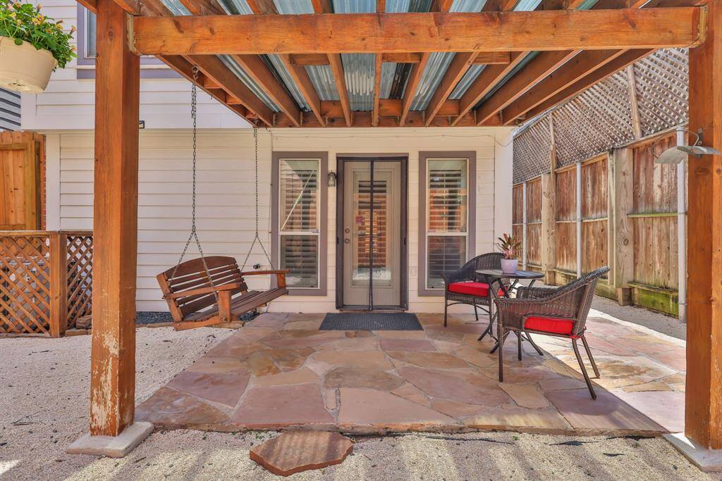 A cozy, covered nook ideal for morning coffee or evening conversation under the stars