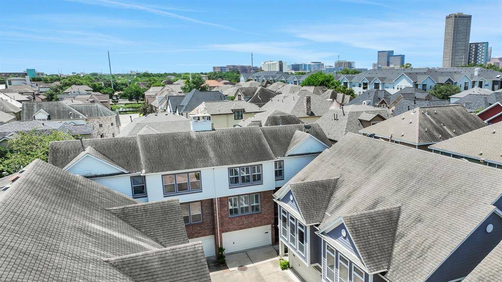 The home’s stately exterior and modern design within a private community