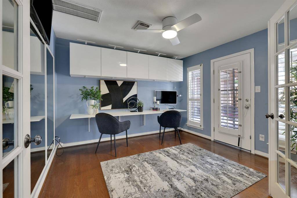 Step through French doors into a dedicated office retreat, complete with direct access to a private patio—ideal for working from home in comfort OR make it another bedroom!