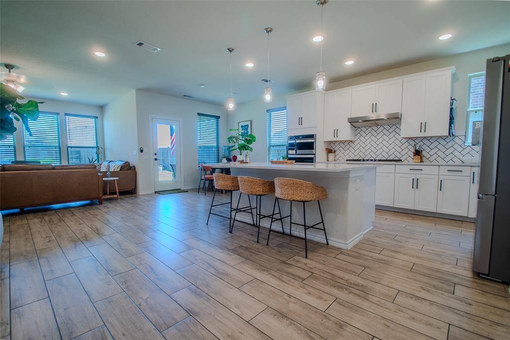 Kitchen, dining room, and living room