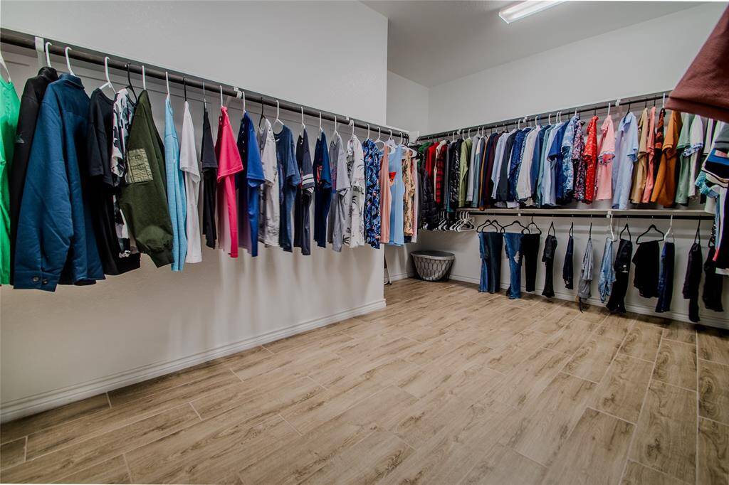 Primary walk-in closet 15x9