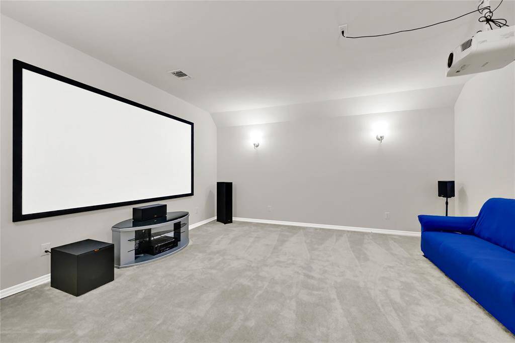 Expansive Media Room – Prewired for a projector and 5.1 surround sound system
