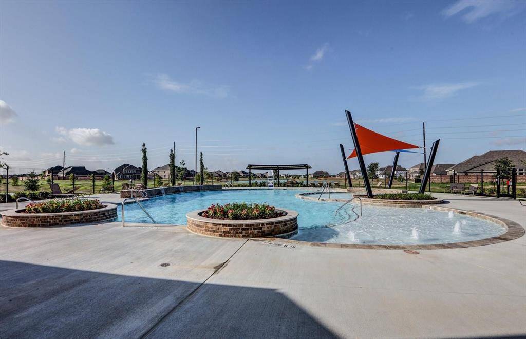 Community Amenities – Splash pad, pool, and playground just a stone’s throw away
