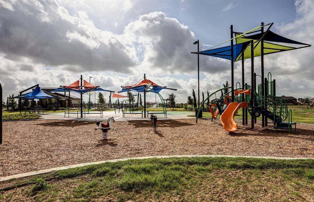 Community Amenities – Splash pad, pool, and playground just a stone’s throw away