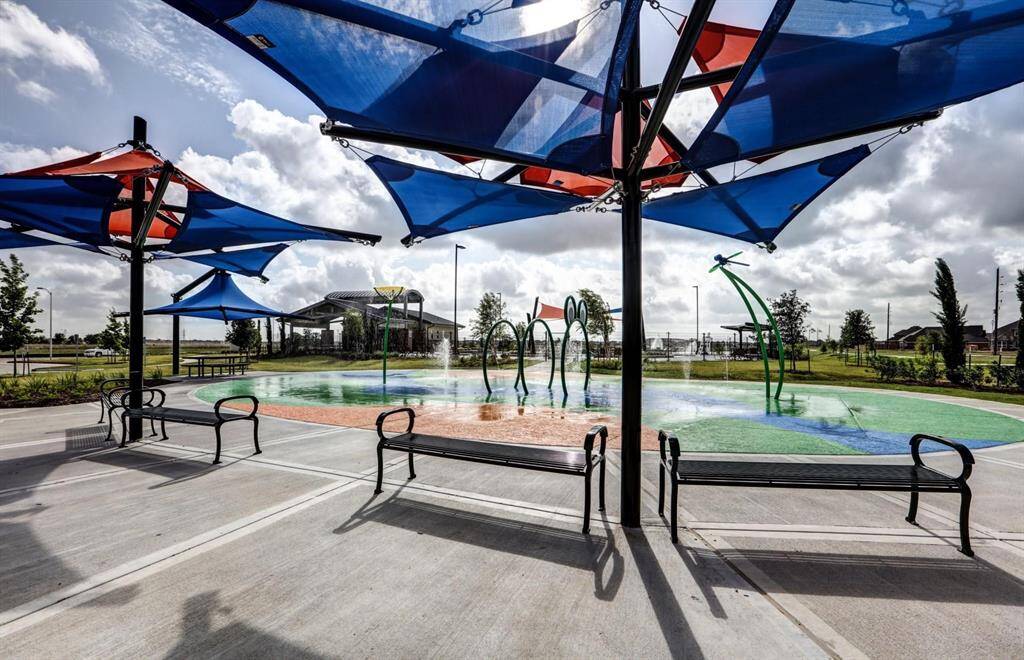 Community Amenities – Splash pad, pool, and playground just a stone’s throw away