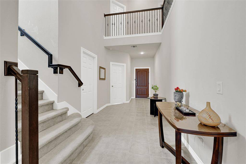 Soaring High Ceilings – A breathtaking hallway welcomes you into this beautiful 3,738 sq. ft. home