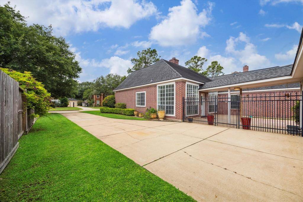 A long driveway leads to the detached garage and offers plenty of space for guest parking.