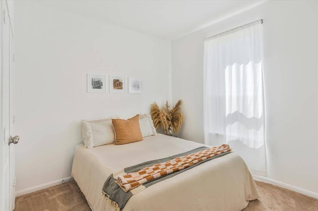 Downstairs bedroom is perfect for guests or this would make a great office!